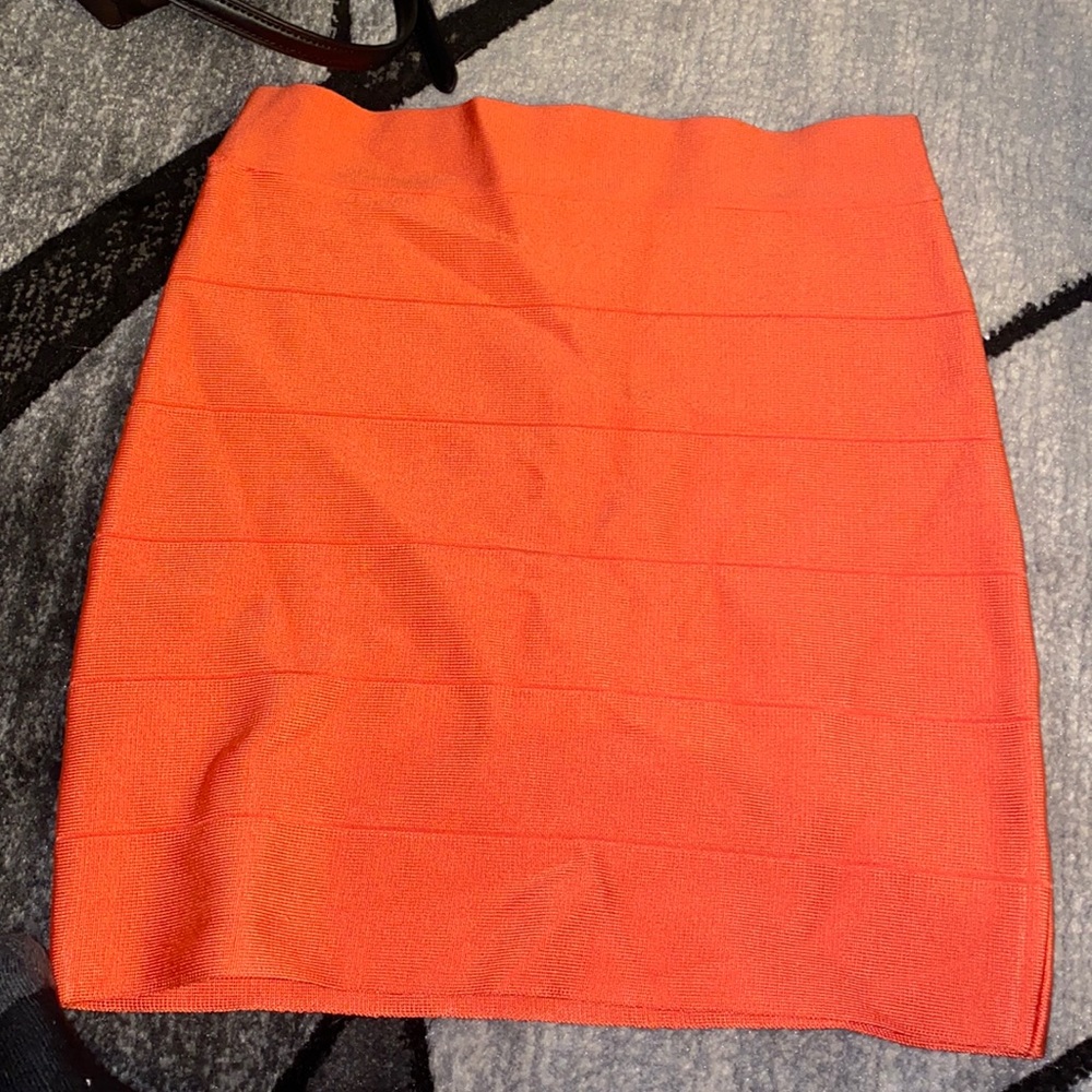 Orange pencil skit Bebe size medium